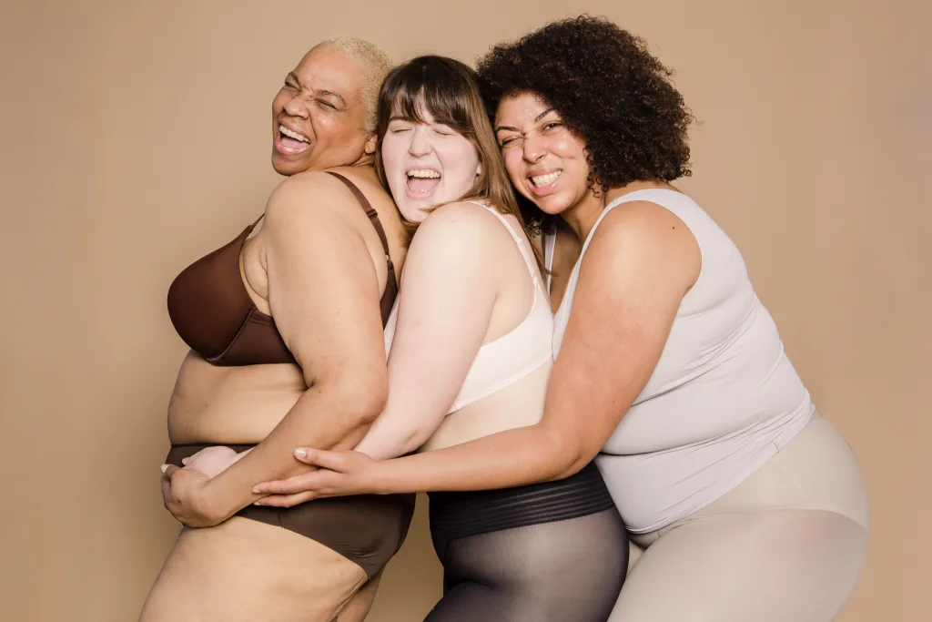 cheerful overweight three women