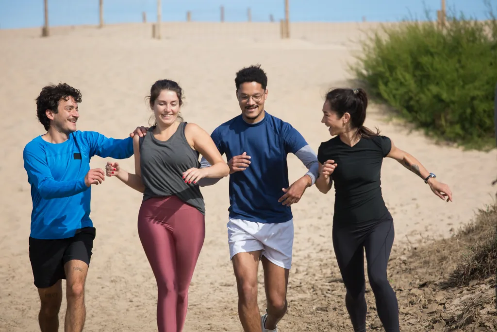 cheerful people running together for weight loss