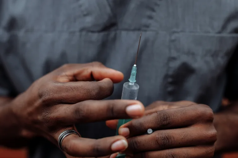 A person checking the syringe weight-loss-injections