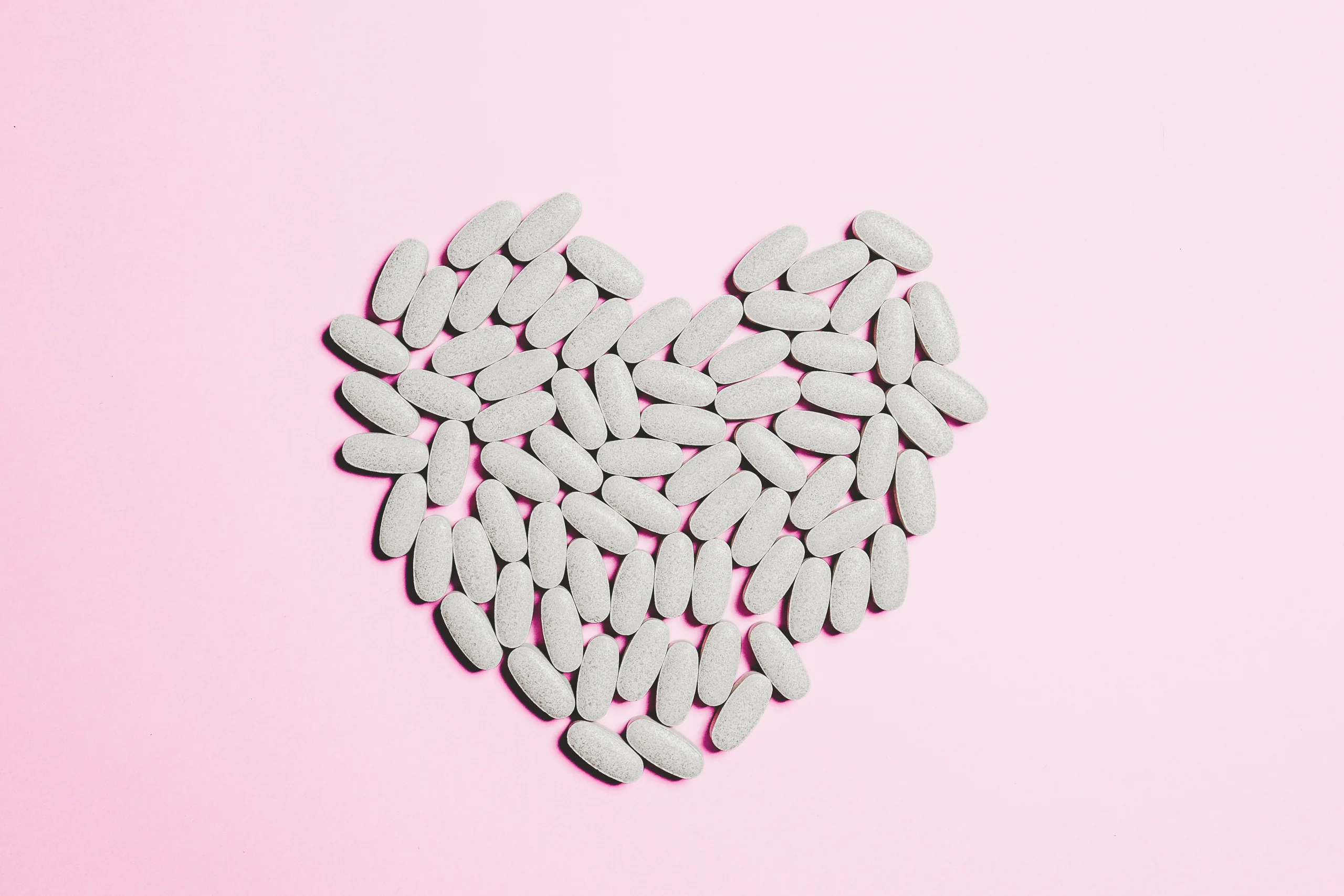 table of medicines shaped as heart