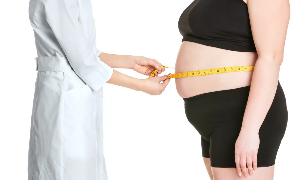 woman being measure by a doctor expert for weight loss injection