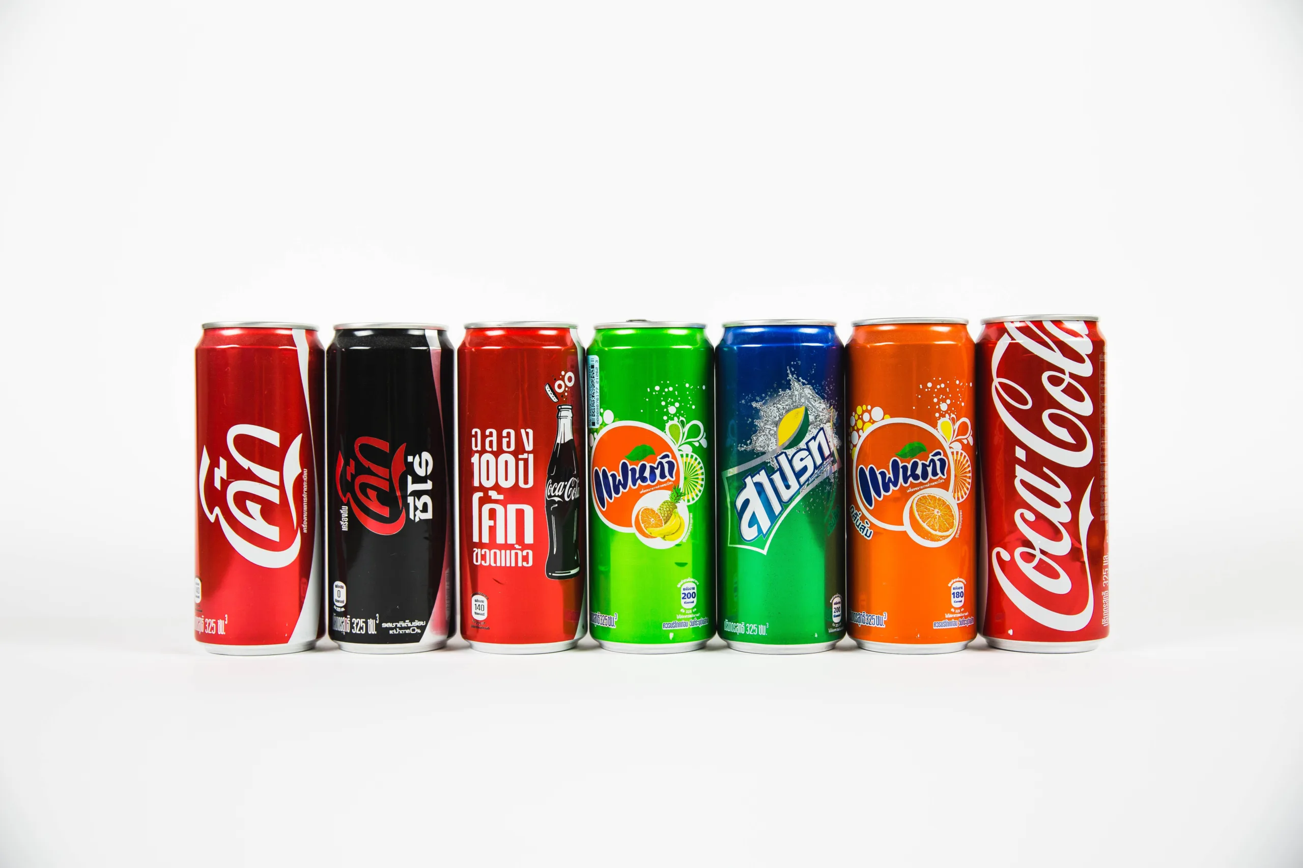 cans of soda variety drinking soda