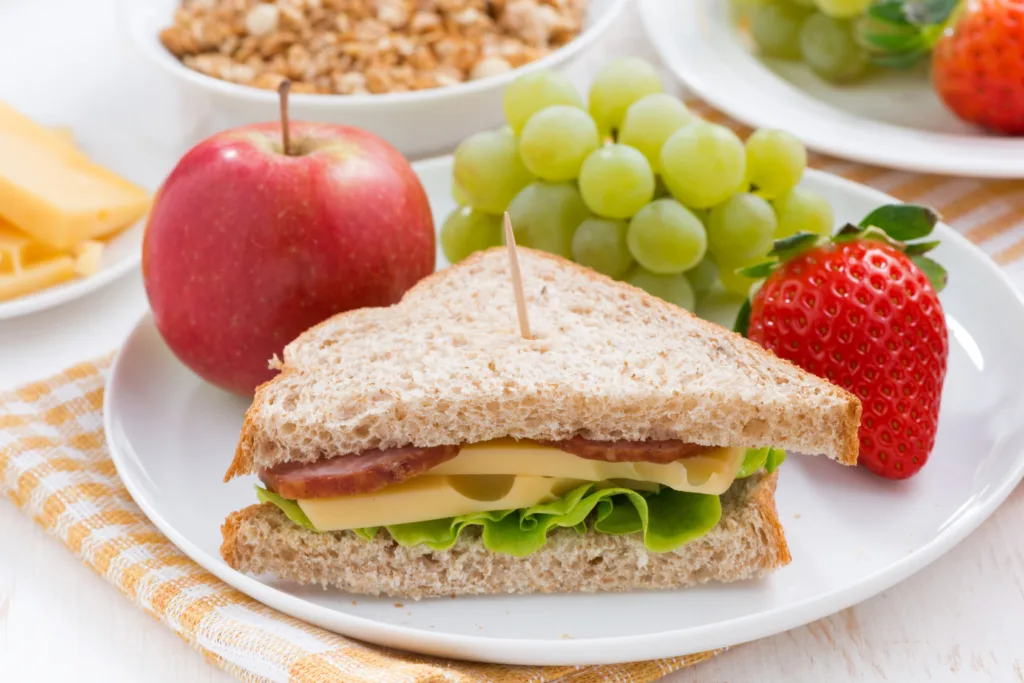 healthy school  snacks breakfast with fresh fruits and vegetables, close-up, horizontal