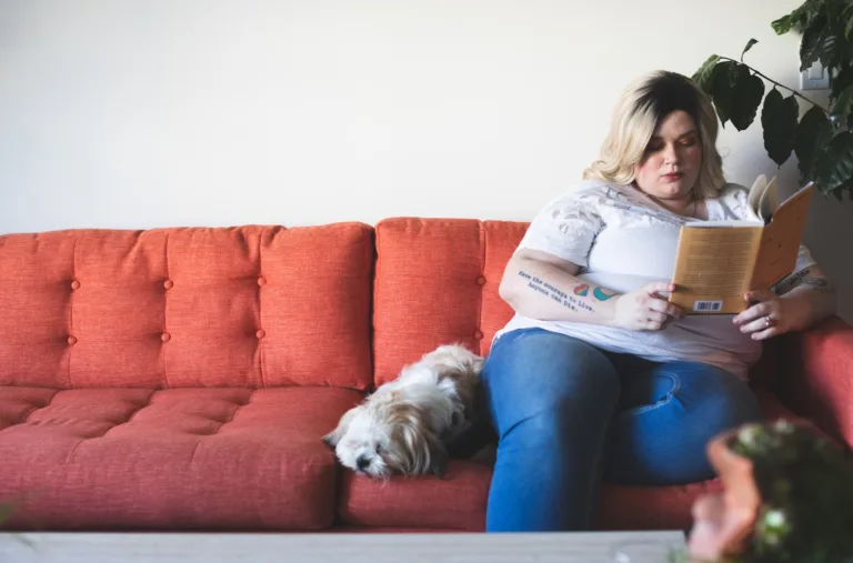 woman sitting on sofa obesity