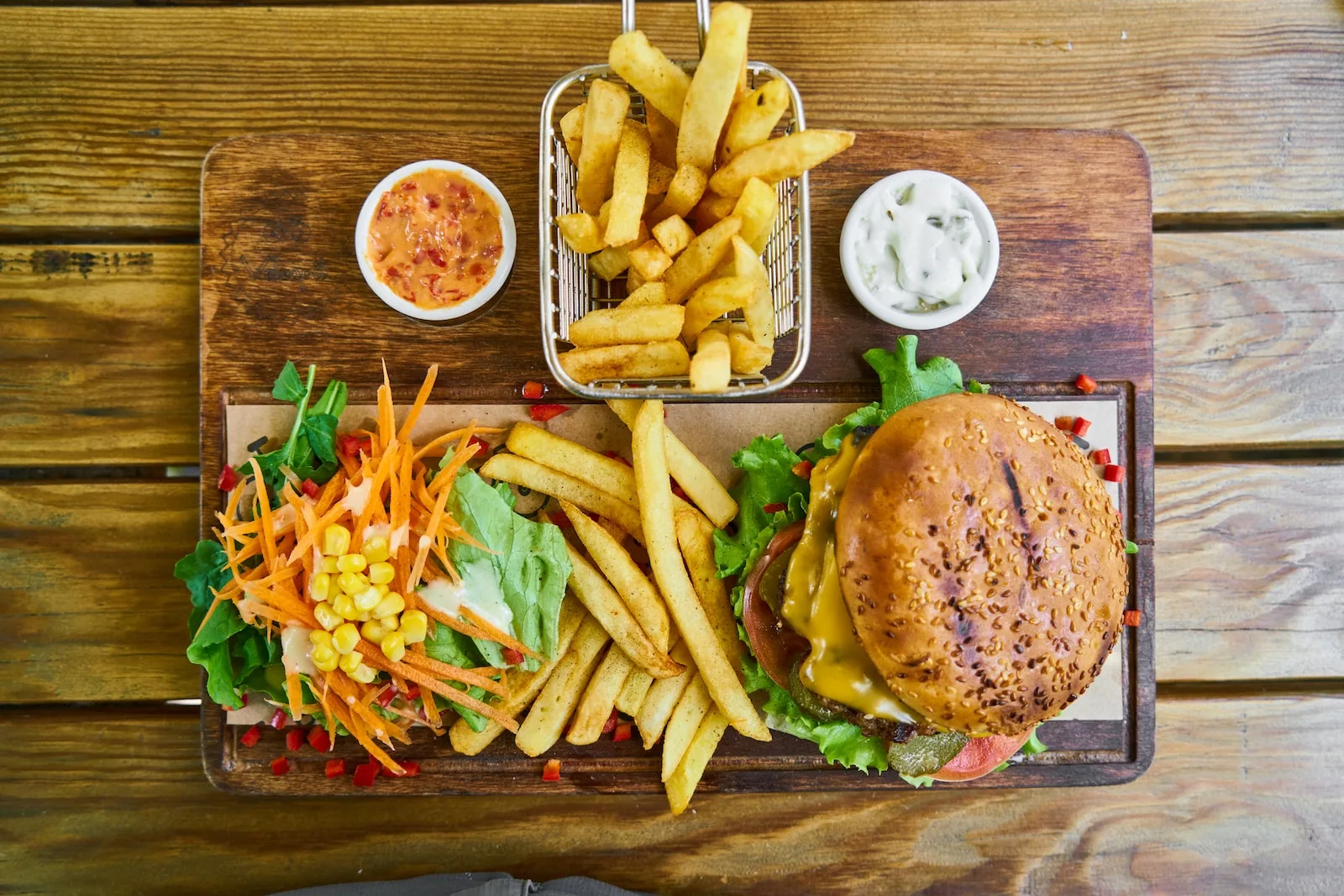 metabolism-boosters-fries-and-burger-on-brown-wooden-tray-carbohydrates