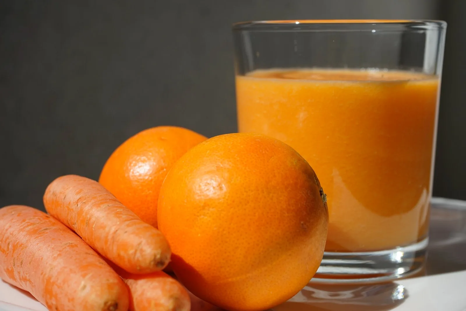 orange fruit on clear glass bowl antioxidants