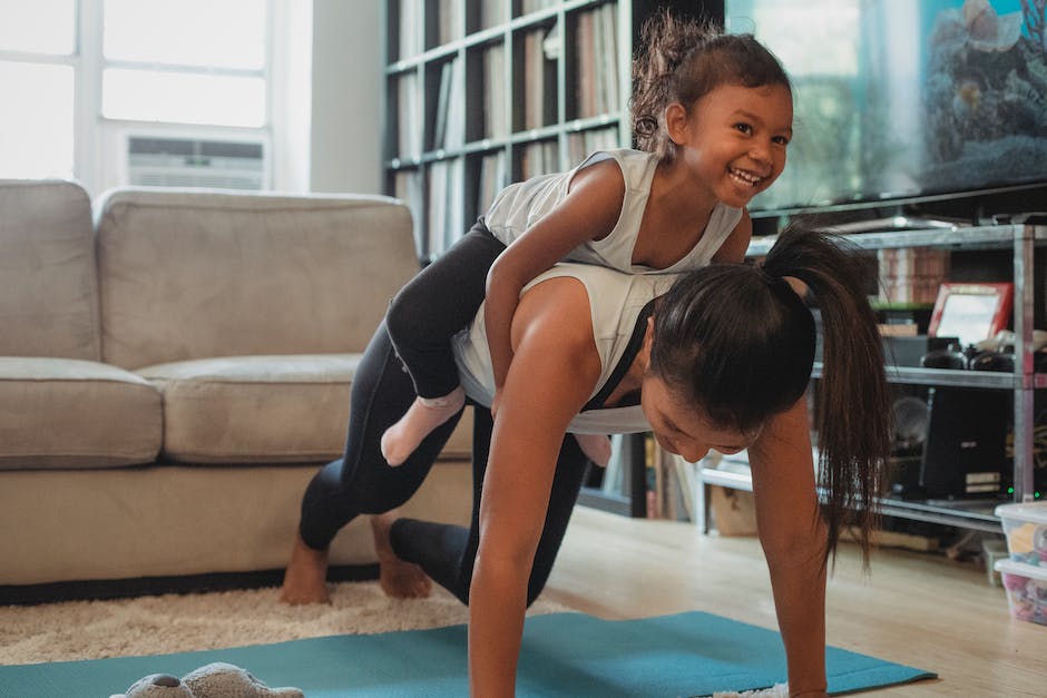 An image depicting a parent and child engaging in a physical activity, promoting healthy habits.