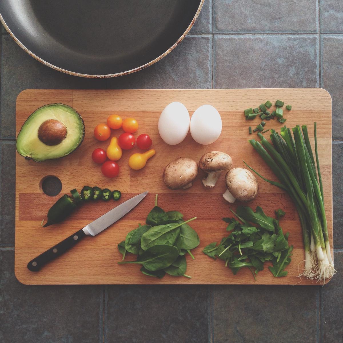 A woman preparing and organizing meals in advance, showcasing the concept of meal prepping.