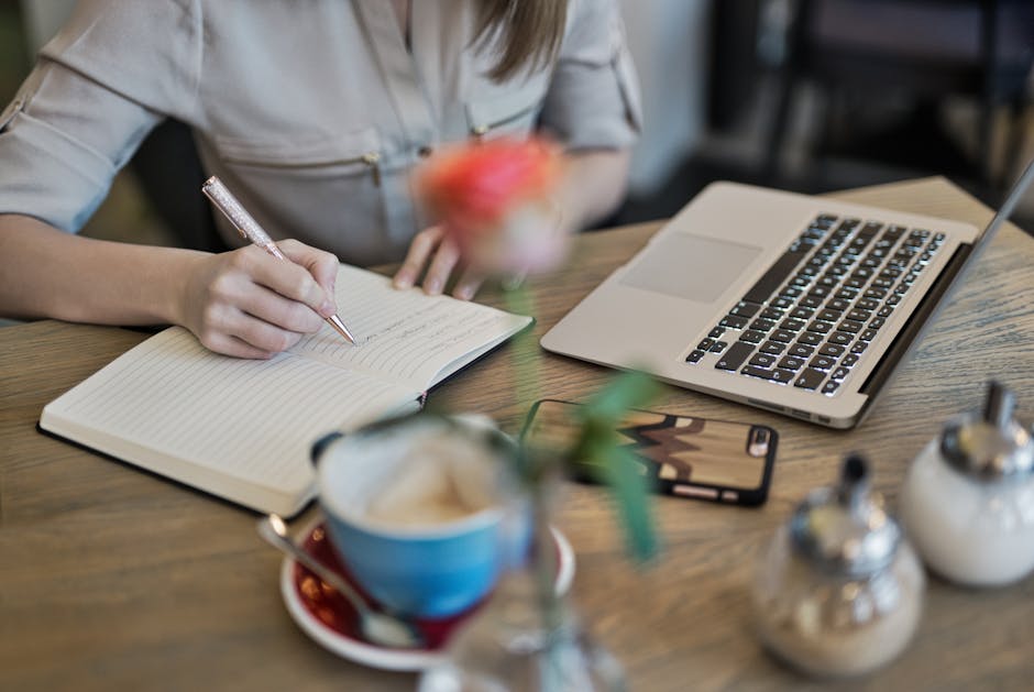 A thoughtful person writing down their personal reasons and motivations for wanting to lose weight in a journal, with a look of determination and focus.