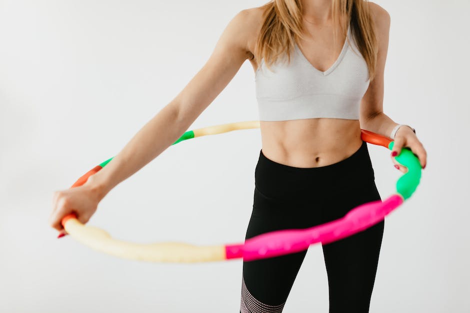 Picture of women measuring waist displaying their weight loss achievement